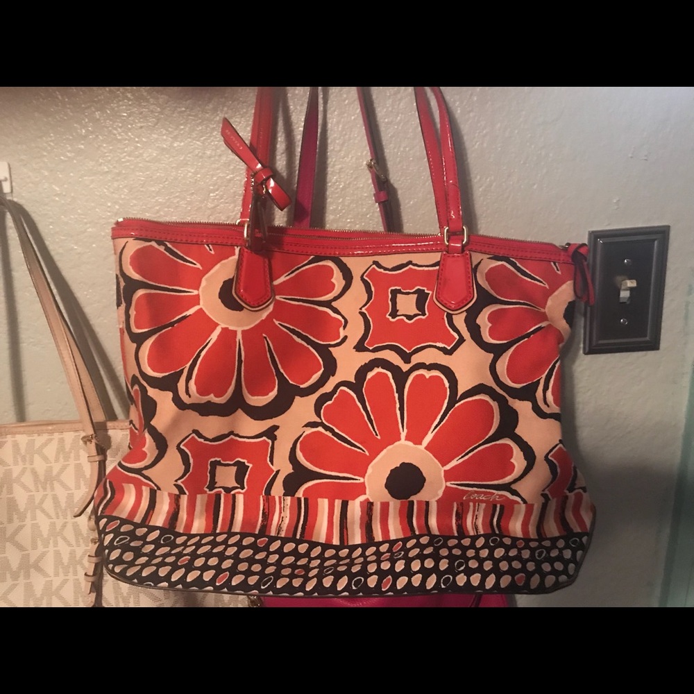 Orange and black floral Authentic Coach purse